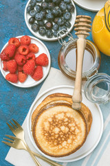 Overhead View on Healthy Brunch with Pancakes and Fruits