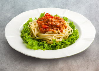 Stir fried spicy spaghetti with minced pork and basil