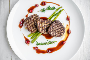 grilled meat steaks. delicious grilled steaks on a plate