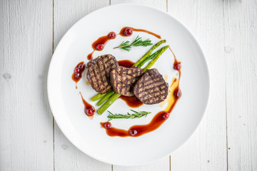 grilled meat steaks. delicious grilled steaks on a plate
