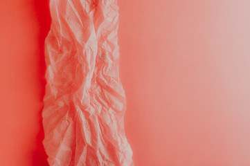 Peach pink background with different textures. Crumpled soft paper on a smooth clean paper background.