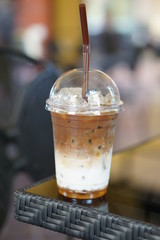 Cup of coffee Caramel macchiato with ice.