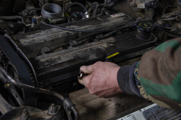 car repair by a master in a car service