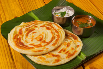 Kerala parotta, popularly known as paratha or porotta, is a delicacy from the state of Kerala