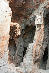 Fototapeta na wymiar Caves and rock formations of the rocky coast of the island of Marettimo, in the Egadi Islands in Sicily, Italy.