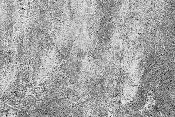 Texture of a concrete wall with cracks and scratches which can be used as a background