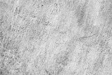 Texture of a concrete wall with cracks and scratches which can be used as a background