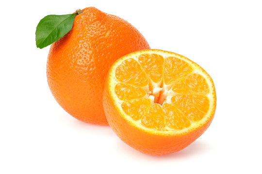 Orange clementine or minneola tangelo with slices and green leaves isolated on white background. Tangerine. Citrus fruit.