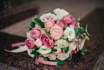 wedding bouquet on a granite background