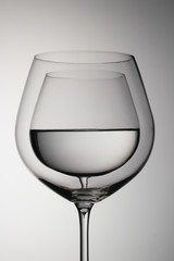 Abstract glass with water in a glass. Drink, unusual, interesting, incredible, advertisement