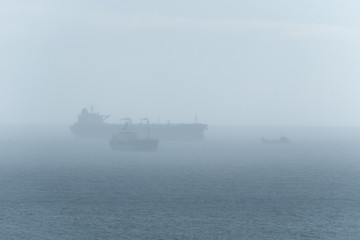 offshore supply ship in fog