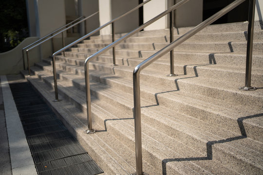 outdoor stairs with metal handrail