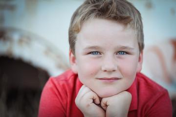 Close up portrait young blonde boy