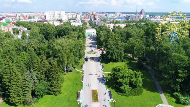 Town square in the park in summer cloudly day - Drone Footage