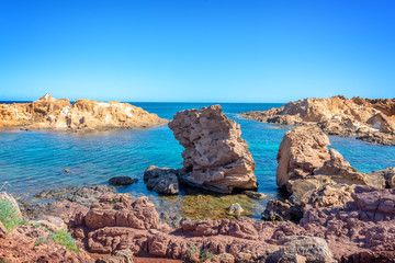 Rocks in the water on the coast of Menorca, Balearic islands, Spain
