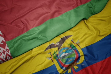 waving colorful flag of ecuador and national flag of belarus.