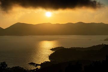 Golden sunset in the Gulf of la Spezia also called gulf of poets. Liguria, Italy, Europe