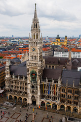 Obraz premium MUNICH, GERMANY - MAY 5, 2019: The top of view from the tower on central old square Marienplatz of Munich and new Town Hall.