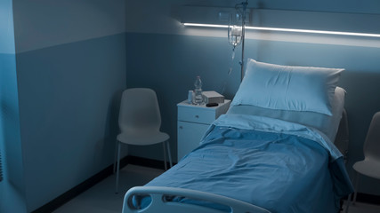 Clean hospital room interior at night