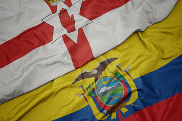 waving colorful flag of ecuador and national flag of northern ireland.
