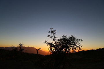 Fototapeta na wymiar Sun set at Wadi Ghul Oman