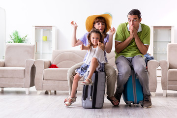 Obraz premium Happy family planning vacation trip