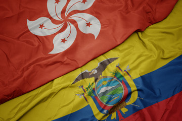 waving colorful flag of ecuador and national flag of hong kong.