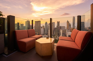 Comfortable sofa unit on rooftop bar and restaurant area