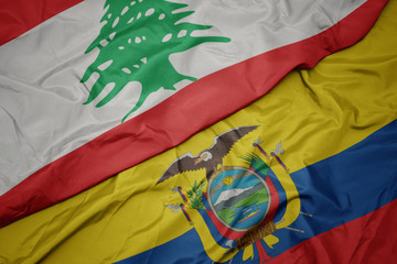 waving colorful flag of ecuador and national flag of lebanon.