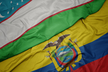 waving colorful flag of ecuador and national flag of uzbekistan.