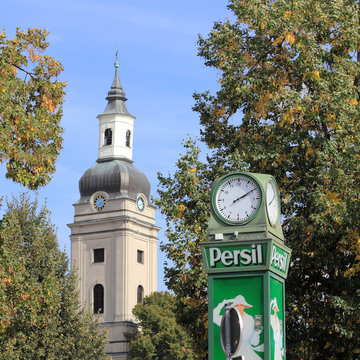 Persil-clock and St Trinity church in Genthin, Germany