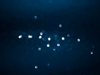 blue glitter christmas abstract background.Circular points.