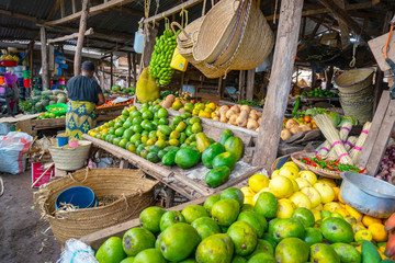 Arusha area: fruits on a table at Native Market in Mto Wa Mbu near the Ngorongoro concervation area withdifferent fruits and wicker dishes