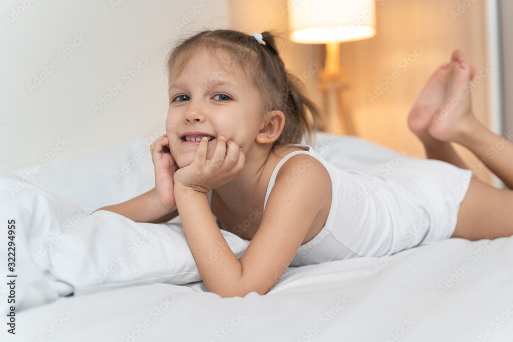 Wall mural girl resting in bed