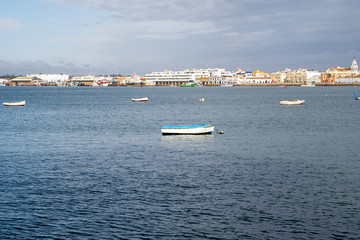 Obraz premium A handful of boats in the harbor during winter in Isla Cristina, Spain