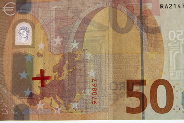 europäische Banknote mit grotem Kreuz über Großbritannien Symbol für das Ausscheiden aus der Europäischen Gemeinschaft