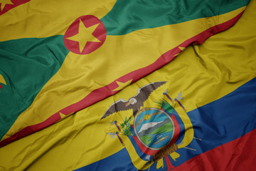 waving colorful flag of ecuador and national flag of grenada.