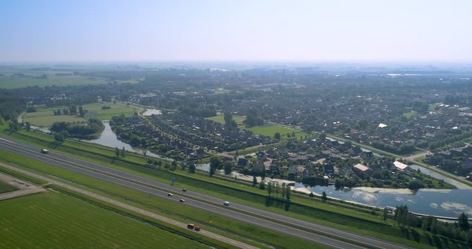 Dutch City Franeker, Houses in a Neighbourhood next to the A31 Highway, Shot Moving Right, Friesland, Netherlands / Holland &ndash; 4K Drone Footage