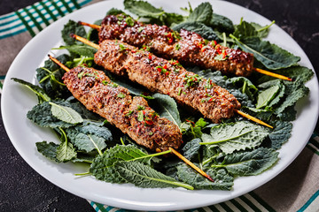Middle Eastern cuisine: lamb kebab on skewers