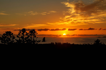 Fototapeta na wymiar Vivid sunset over the sea at Yeppoon, Queensland, Australia