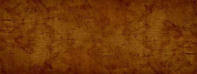  Red grunge background. Orange rough dirty surface texture. Abstract wide grunge banner with copy space for your design.