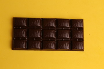 milk chocolate tablet in color background