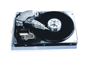 disassembled hard drive. computer component hdd with a mirror effect. close-up.