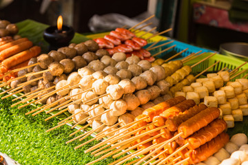 Meatballs with bamboo, wood stick. Traditional Street Food Thailand.