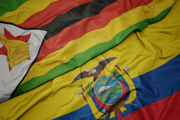 waving colorful flag of ecuador and national flag of zimbabwe.