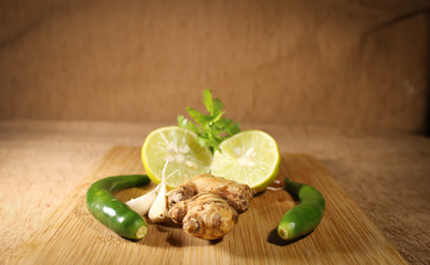 A set of Refresh items on the table, green, yellow. Ginger Garlic, chilli 