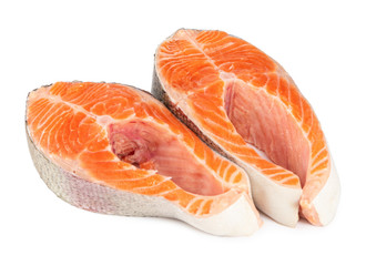 Two steaks of fresh raw trout isolated on white
