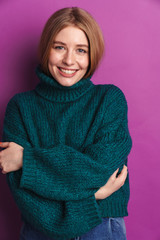 Positive optimistic young woman posing isolated