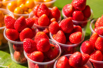 Strawberries in a glass of fruit eating street food in glass, look so fresh and so sweet.