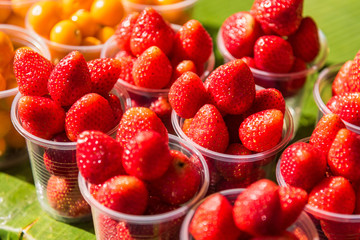 Strawberries in a glass of fruit eating street food in glass, look so fresh and so sweet.